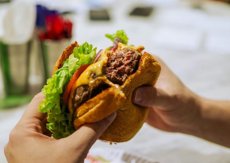 Harmful Food processed meats, sausages, and additives on a kitchen table