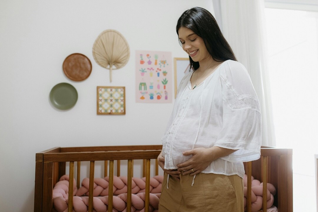 cozy new baby nursery with crib and gentle decor